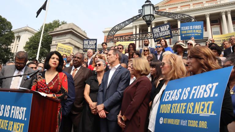 Texas State Senator Carol Alvarado, a Democrat, speaks in a crowd of other Democratic state lawmakers outside the Massachusetts State House on Wednesday, Aug. 6, 2025 in Boston. (AP Photo / Leah Willingham)