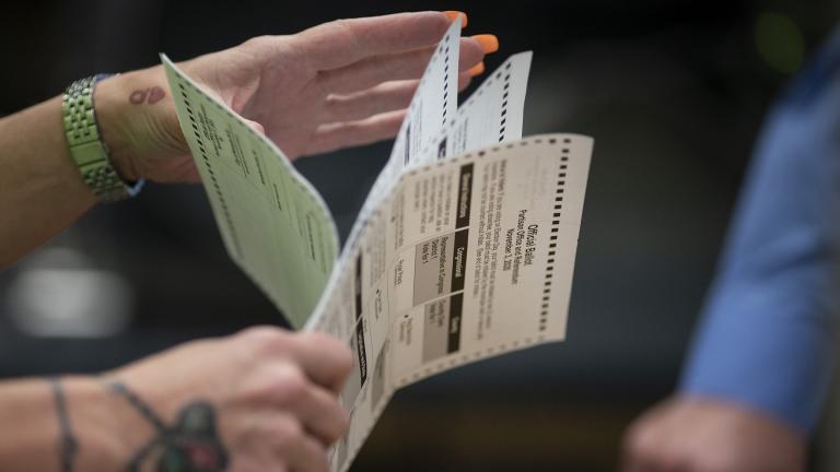 In this Nov. 3, 2020, file photo, poll workers sort out early and absentee ballots at the Kenosha Municipal building on Election Day in Kenosha, Wis. (AP Photo / Wong Maye-E, File)