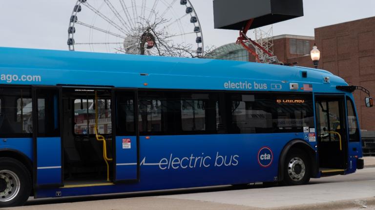A Chicago Transit Authority electric bus charges at Navy Pier Tuesday, Feb. 14, 2023, in Chicago. No. 66 is the first of many routes that will be converted to battery power as the CTA moves to all-electric by 2040. (AP Photo / Erin Hooley)