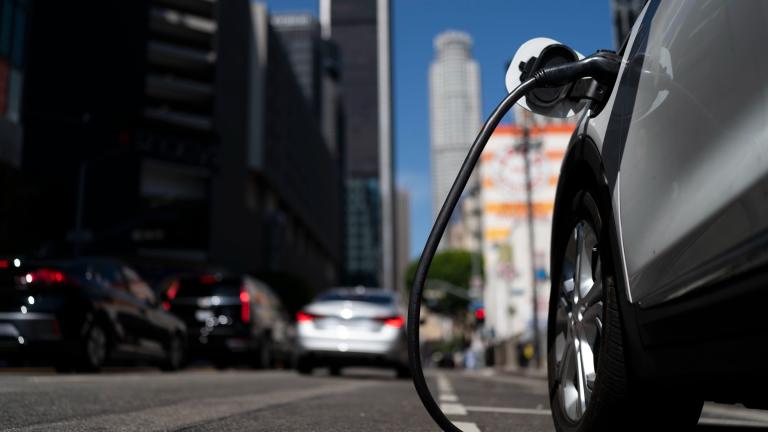 An electric vehicle is plugged into a charger in Los Angeles, Thursday, Aug. 25, 2022. (AP Photo / Jae C. Hong, File)