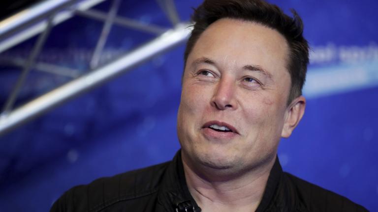 Tesla and SpaceX CEO Elon Musk arrives on the red carpet for the Axel Springer media award in Berlin on Dec. 1, 2020. (Hannibal Hanschke / Pool Photo via AP, File)