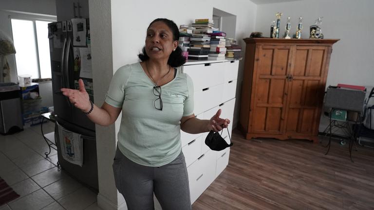 Cristina Livingston recounts the problems she has had in her apartment including a leaking ceiling and mold, Friday, June 18, 2021, at her home in Bay Harbor Islands, Fla. (AP Photo / Wilfredo Lee)