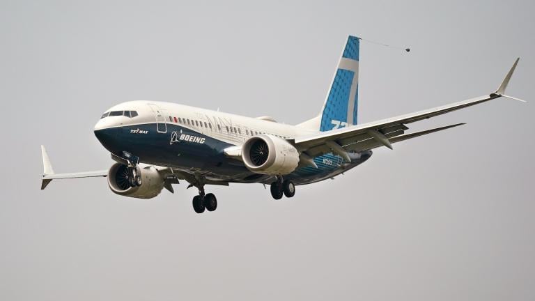 In this Wednesday, Sept. 30, 2020, file photo, a Boeing 737 Max jet, piloted by Federal Aviation Administration Chief Steve Dickson, prepares to land at Boeing Field following a test flight in Seattle. (AP Photo/Elaine Thompson, File)