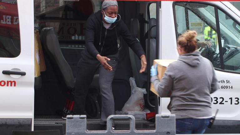 Supplies to fight the spread of COVID-19 are donated at United Center on Saturday, April 25, 2020 in Chicago. The city started a face mask drive before a statewide order requiring face coverings in public takes effect May 1. (Evan Garcia / WTTW News)