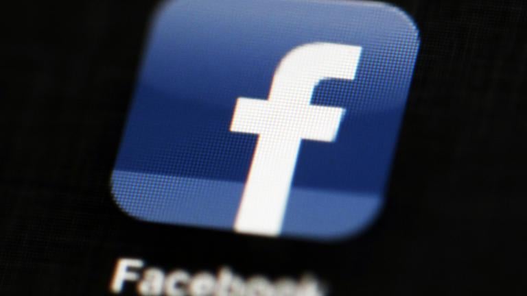 This May 16, 2012 file photo shows the Facebook app logo on a mobile device in Philadelphia. On Monday, Oct. 12, 2020, Facebook announced it is banning posts that deny or distort the Holocaust. (AP Photo / Matt Rourke, File)