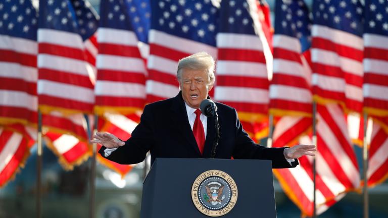 President Donald Trump speaks to crowd before boarding Air Force One at Andrews Air Force Base, Md., in this Wednesday, Jan. 20, 2021, file photo. (AP Photo / Luis M. Alvarez, File)