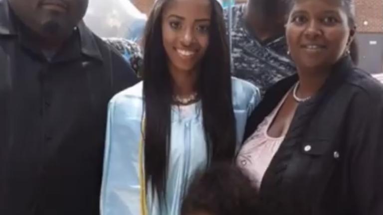 Stacy Vaughn-Harrell, right, celebrates the 2014 graduation of her daughter, Kimberlyn, center. (Provided: Salvi, Schostok and Pritchard, P.C.)