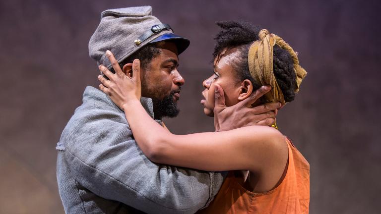 Kamal Angelo Bolden and Aimé Donna Kelly in the Chicago premiere of “Father Comes Home from the Wars (Parts 1, 2 & 3)” by Suzan-Lori Parks. (Credit: Liz Lauren)