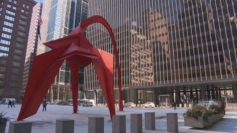 “Flamingo,” a sculpture by Alexander Calder, looms over Federal Plaza in Chicago. (WTTW News)