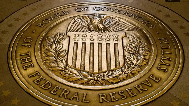 In this Feb. 5, 2018, file photo, the seal of the Board of Governors of the United States Federal Reserve System is displayed in the ground at the Marriner S. Eccles Federal Reserve Board Building in Washington. (AP Photo / Andrew Harnik, File)