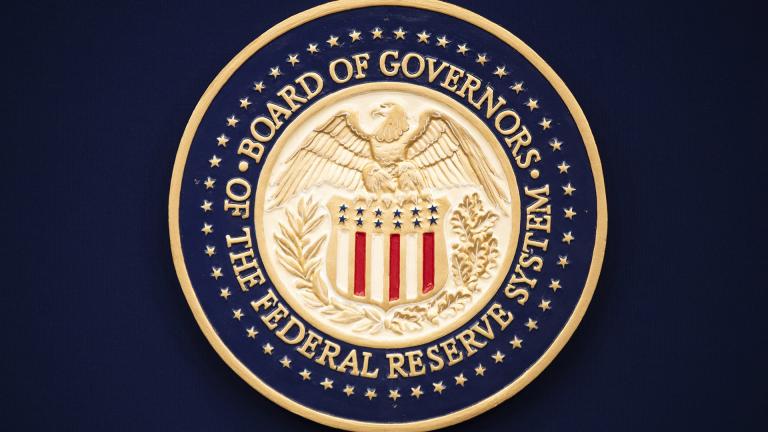 In this July 31, 2019 file photo, The Federal Reserve logo is shown before the start of a scheduled news conference by Chairman Jerome Powell in Washington.  (AP Photo / Manuel Balce Ceneta, File)