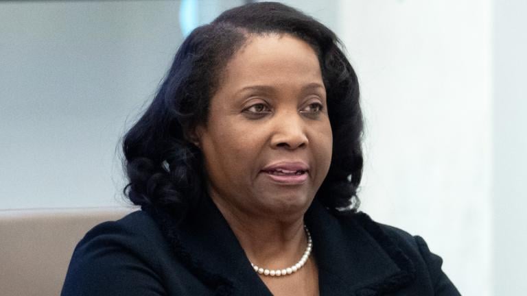 Federal Reserve Board of Governors member Lisa Cook listens during an open meeting of the Board of Governors, June 25, 2025, in Washington. (AP Photo/Mark Schiefelbein, File)