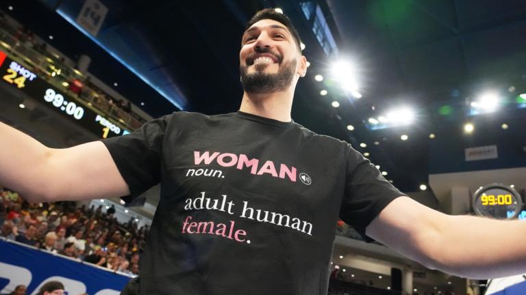 Former NBA center Enes Kanter Freedom greets a friend before a WNBA basketball game between the Indiana Fever and the Chicago Sky, Sunday, Aug. 23, 2026, in Chicago. (AP Photo / Nam Y. Huh)