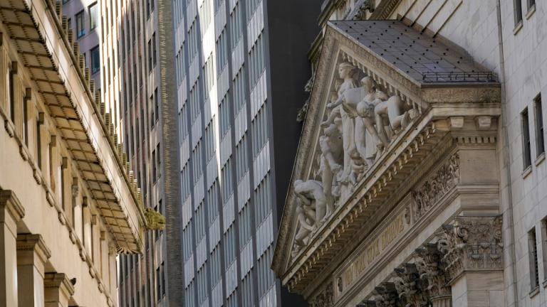 The New York Stock Exchange building, right, is seen, Tuesday, Sept. 27, 2022, in the Financial District of New York. (AP Photo / Mary Altaffer)
