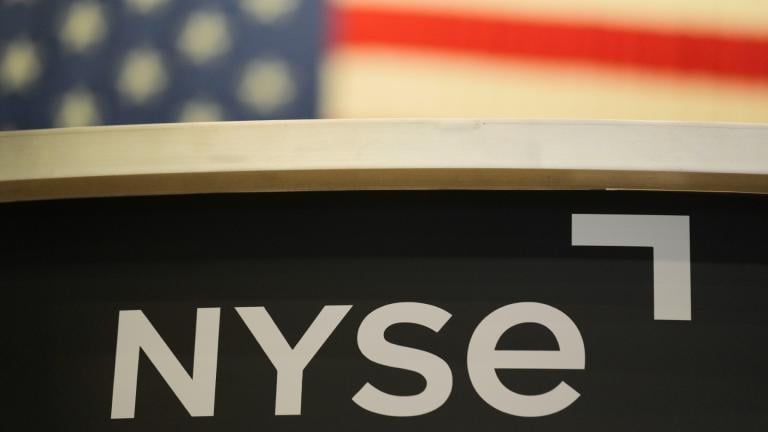 An NYSE sign is displayed on the floor at the New York Stock Exchange in New York, Thursday, Jan. 2, 2025. (AP Photo/Seth Wenig, File)