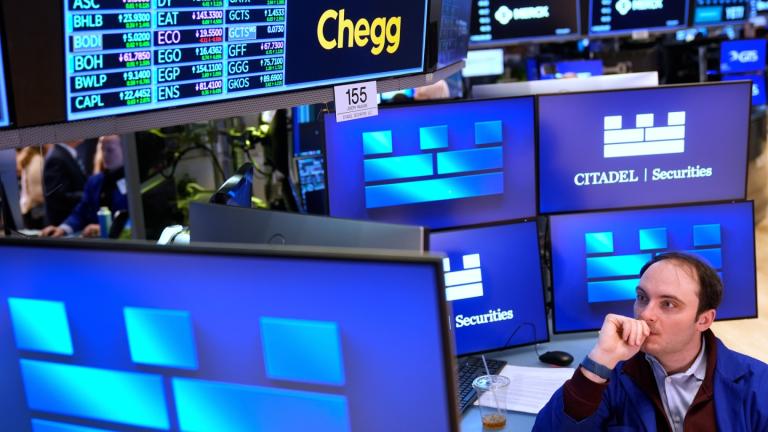 Joseph Maguire works on the floor at the New York Stock Exchange in New York, Tuesday, April 8, 2025. (AP Photo/Seth Wenig)