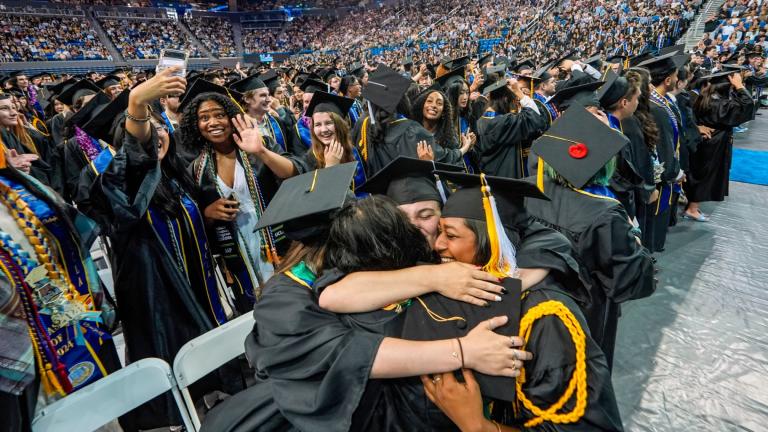 FILE - UCLA students celebrate during a commencement ceremony inside Pauley Pavilion on UCLA campus, in Los Angeles, June 14, 2024. (Damian Dovarganes / AP Photo, File)