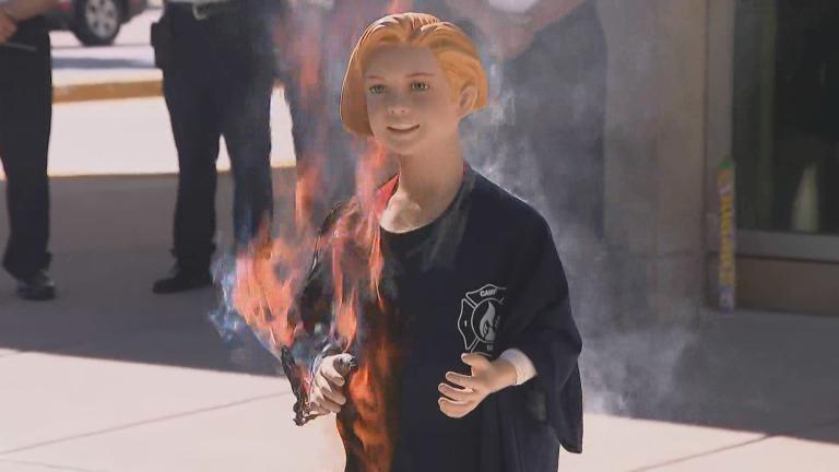 Fire safety officials stage a demonstration on July 1, 2024, showing the dangers of fireworks. The event was held at the University of Chicago Medicine Comer Children’s Hospital. (WTTW News)