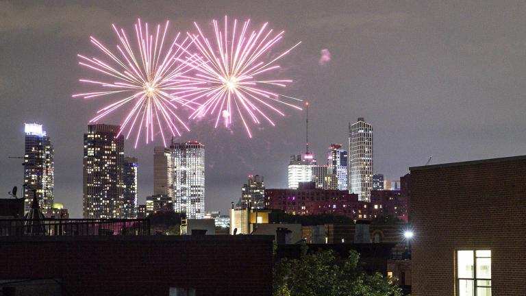 In this Friday, June 19, 2020 photo, fireworks explode during Juneteenth celebrations above the Bedford-Stuyvesant neighborhood in the Brooklyn borough of New York. (AP Photo / John Minchillo, File)