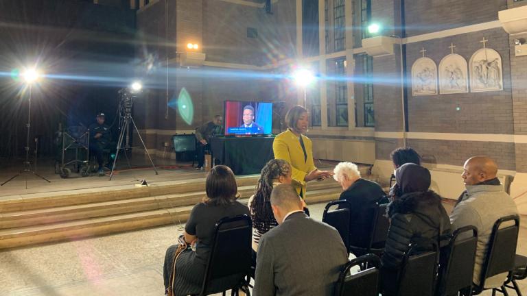Austin residents watch the WTTW News mayoral forum. (Blair Paddock)