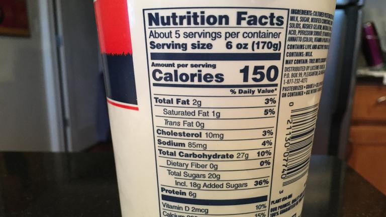 A nutrition fact label for vanilla yogurt shows a 6-ounce serving contains 20 grams of sugar – of which 18 grams are added sugars. (Kristen Thometz / WTTW News)