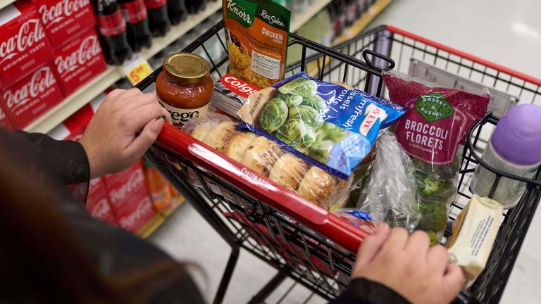 FILE - A food shopper pushes a cart of groceries at a supermarket in Bellflower, Calif., on Monday, Feb. 13, 2023. (AP Photo / Allison Dinner, File)