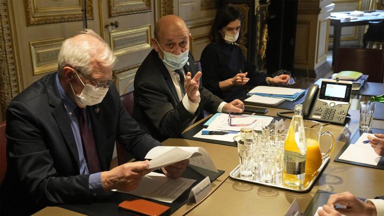 High Representative of the European Union for Foreign Affairs and Security Policy Josep Borrell, left, French Foreign Minister Jean-Yves Le Drian, second left, facing with German Foreign minister Annalena Baerbock, second right, and Italian Foreign minister Luigi Di Maio, attend a meeting before phone call with their other G7 counterparts at Quai d'Orsay foreign ministry, in Paris, France, Monday, Feb. 21, 2022. (AP Photo / Michel Euler / Pool)