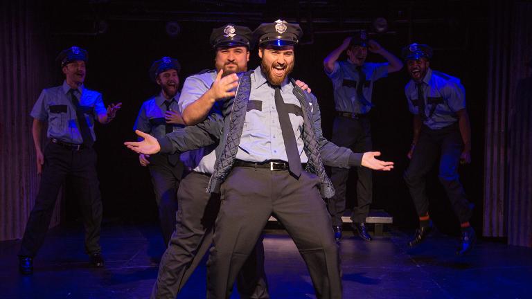 “The Full Monty” at Theo Ubique Cabaret Theatre. Front: Nick Druzbanski, left, and Matt Frye. Background, from left: Jonathan Schwart, Neil Stratman, Joe Giovannetti and Marc Prince. (Photo by Austin D. Oie)