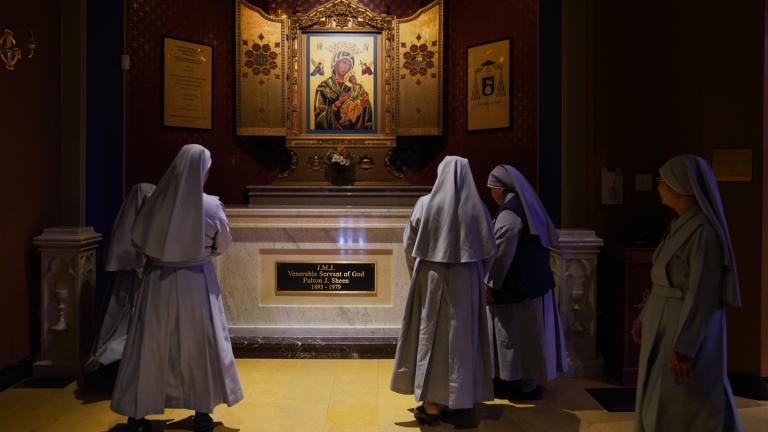 Nuns pray at the tomb of Archbishop Fulton Sheen at the Cathedral of St. Mary of the Immaculate Conception in Peoria, Ill., on July 15, 2026. (AP Photo / Jessie Wardarski)