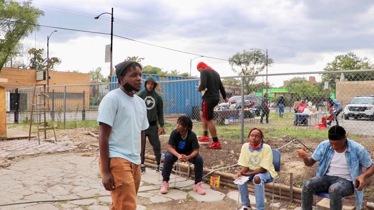 Tyrell Jerry, a student at the Chicago High School for the Arts, performs at the first open mic held at a South Side community garden on Aug. 5, 2020. (Evan Garcia / WTTW News)