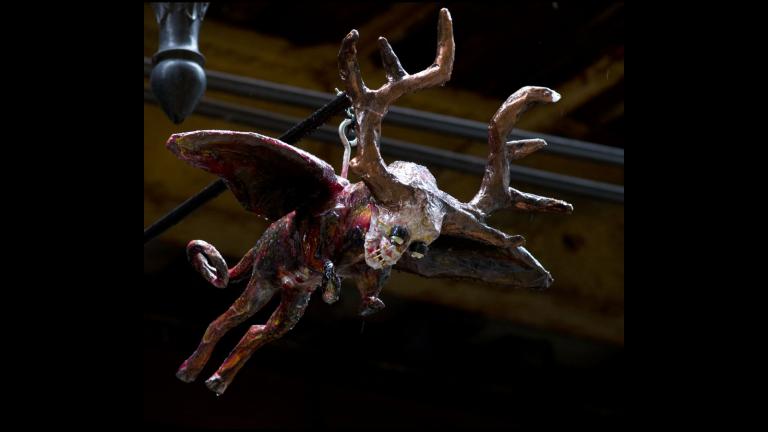 A gargoyle flies above the southeast corner of Wabash Avenue and Randolph Street. (Credit: Jeff Lassahn)