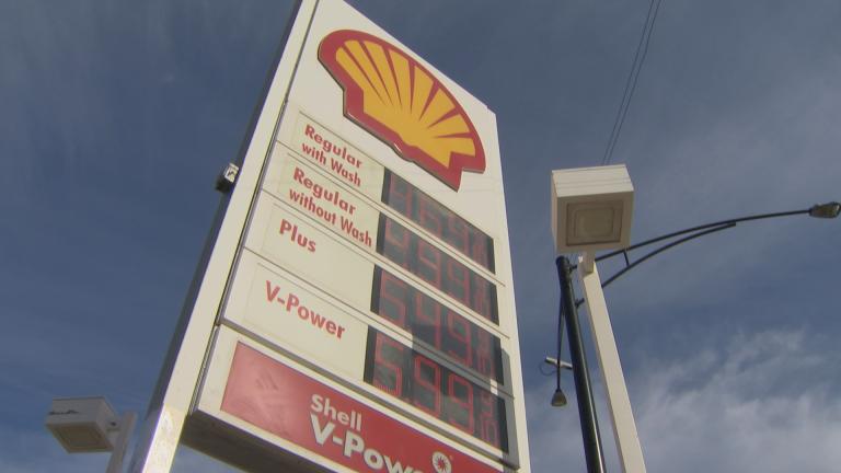 Gas prices are displayed at a Chicago gas station on March 14, 2022. (WTTW News)