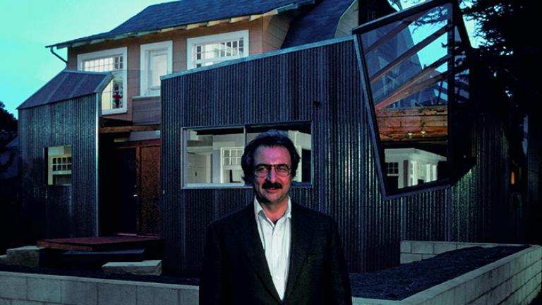Frank Gehry stands in front of his newly completed house in Santa Monica, 1978. (Gehry Partners LLC)