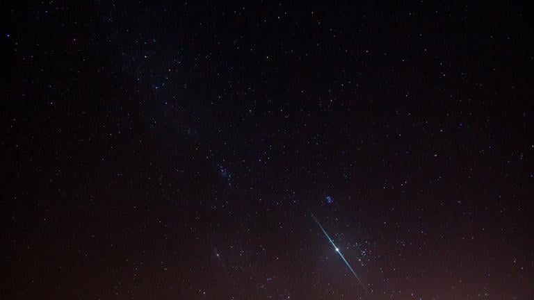 A Geminid meteor streaks across the sky. (Stephen Rahn / Flickr Creative Commons)