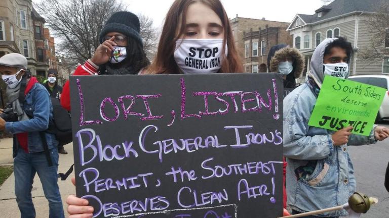 Protesters gather near the Logan Square home of Mayor Lori Lightfoot to voice their opposition to General Iron’s plans to move to the Southeast Side on Saturday, Nov. 14, 2020. (Annemarie Mannion / WTTW News)