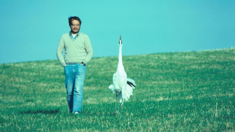 Conservationist George Archibald and a crane named Tex. (Photo courtesy of the International Crane Foundation) 