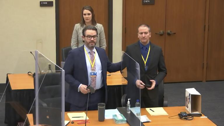 In this screen grab from video, defense attorney Eric Nelson, left, defendant and former Minneapolis police officer Derek Chauvin, right, and Nelson’s assistant Amy Voss, back, introduce themselves to potential jurors as Hennepin County Judge Peter Cahill Tuesday, March 23, 2021, presides over jury selection in the trial of Chauvin at the Hennepin County Courthouse in Minneapolis, Minn. Chauvin is charged in the May 25, 2020 death of George Floyd. (Court TV, via AP, Pool)