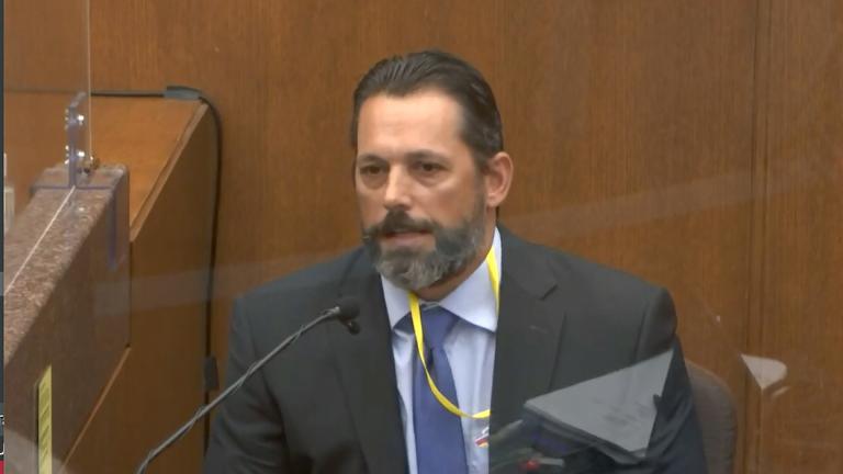 In this image from video, Minneapolis Police Lt. Johnny Mercil, a use of force trainer, testifies as Hennepin County Judge Peter Cahill presides Tuesday, April 6, 2021, in the trial of former Minneapolis police Officer Derek Chauvin at the Hennepin County Courthouse in Minneapolis. (Court TV via AP, Pool)