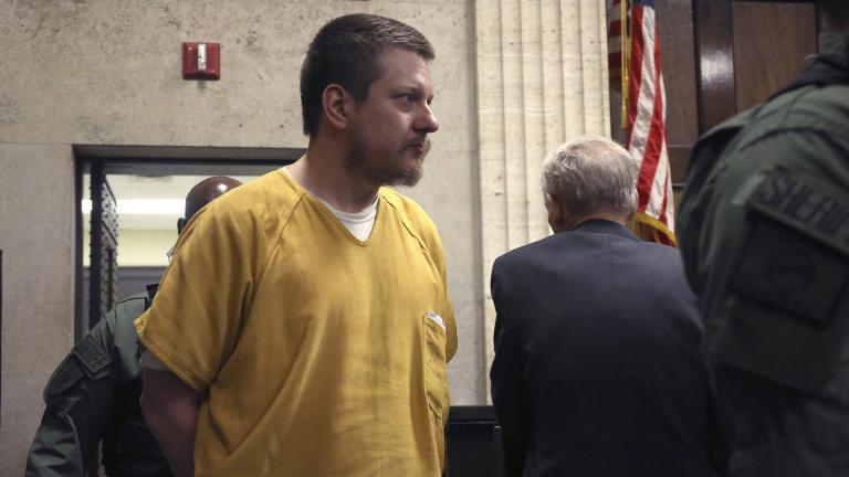 In this Jan. 18, 2019, file photo, former Chicago police Officer Jason Van Dyke is escorted into the courtroom for his sentencing hearing in Chicago, for the 2014 shooting of Laquan McDonald. (Antonio Perez / Chicago Tribune via AP, Pool, File)