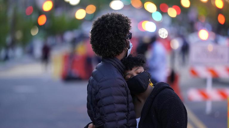 A couple dances at Black Lives Matter Plaza near the White House on Tuesday, April 20, 2021, in Washington, after the verdict in Minneapolis, in the murder trial against former Minneapolis police officer Derek Chauvin was announced. (AP Photo / Alex Brandon)