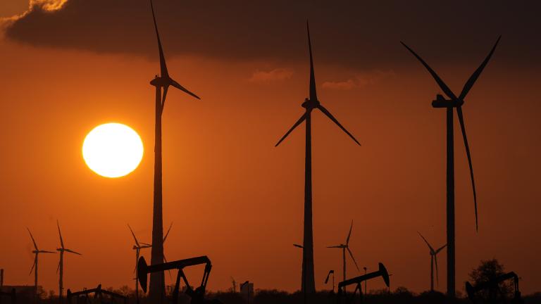 Wind turbines produce power during sundown in Emlichheim, Germany, Friday, March 18, 2022. (AP Photo / Martin Meissner, file)