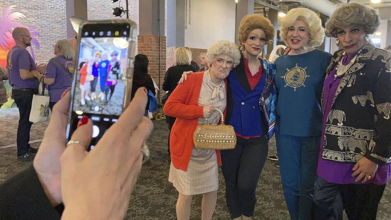Drag queen performers dressed as characters from “The Golden Girls” pose for a photo at the Navy Pier in Chicago, Friday, April 22, 2022. Golden-Con, which lasts thru Sunday, is giving those who adored the NBC sitcom a chance to mingle, see panels and buy merchandise.  (AP Photo / Terry Tang)
