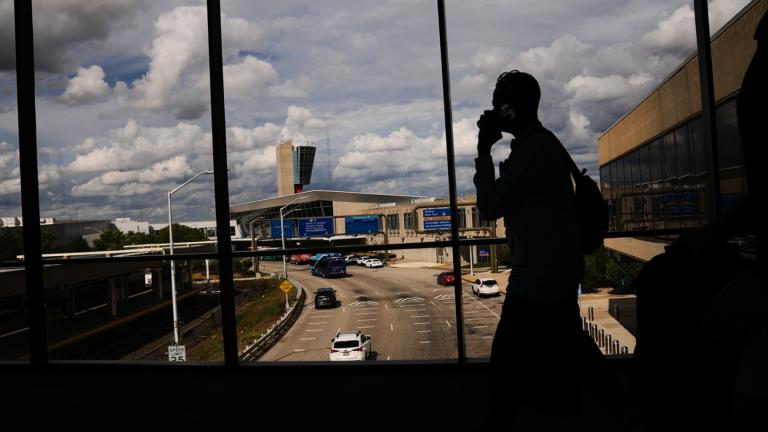 Passengers walk from a terminal at Philadelphia International Airport in Philadelphia, Tuesday, Oct. 7, 2025. (AP Photo / Matt Rourke)