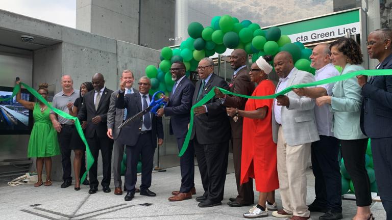 Mayor Brandon Johnson, center, joined project leaders and other city officials for a ribbon cutting ceremony at the newly built Damen Green Line ‘L’ station on Aug. 5, 2024. (Eunice Alpasan / WTTW News)