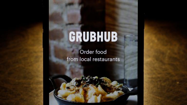 The Grubhub app is seen on an iPhone in Chicago, Feb. 20, 2018. (AP Photo / Charles Rex Arbogast, File)
