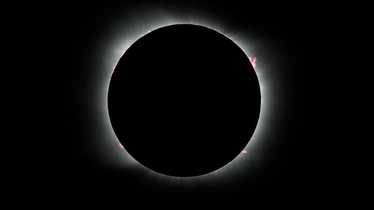  The moon covers the sun during a solar eclipse in Piedra del Aguila, Argentina, Monday, Dec. 14, 2020. (AP Photo / Natacha Pisarenko)