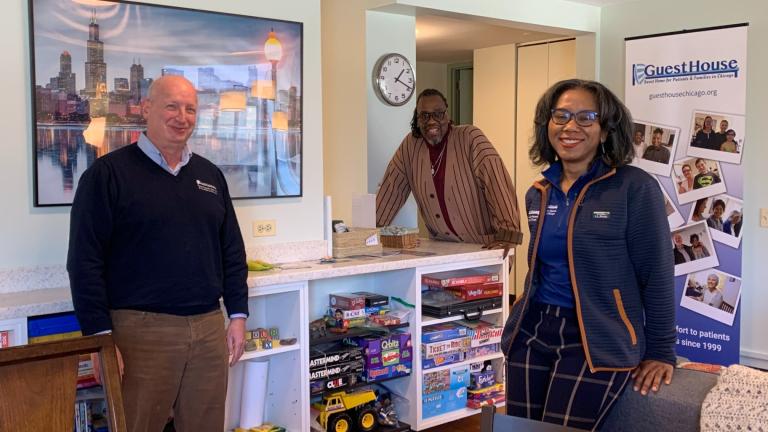 Guest House offers temporary housing to medical patients, their family members and military veterans. From left to right, executive director Adam Helman, community outreach manager and assistant house manager Art Sims and director of development Dionne Nicole Smith at the community room on April 5, 2024. (Eunice Alpasan / WTTW News)