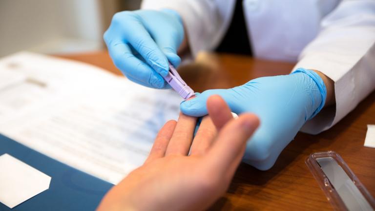 A doctor tests a patient for HIV in a file photo. (Alex Levine / iStock)