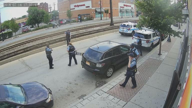 A still image taken from video footage released Thursday, Aug. 16 by the Chicago Police Department shows the immediate aftermath of the police-involved shooting of Harith Augustus, 37, on Saturday, July 14, 2018.