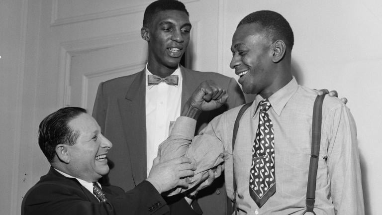 Abe Saperstein and members of the Harlem Globetrotters. 